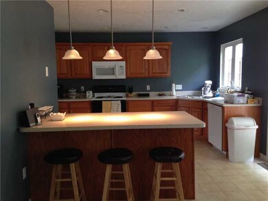 Kitchen. Oak cabinets with additional peninsula wi