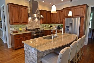 The very spacious Kitchen includes custom cabinetr