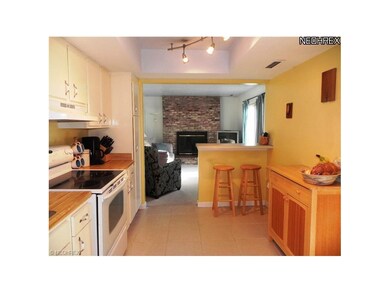 Another view of the kitchen and snack bar area.  R