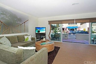 Main Home:  Living room view to front patio and Ag