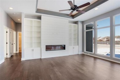Great Room features floor to ceiling windows and s