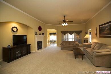 Gorgeous, model-like great room has arched enterta