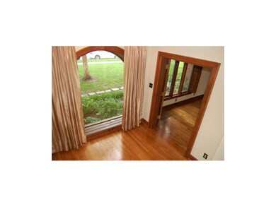 Off the living room and through double doors is th