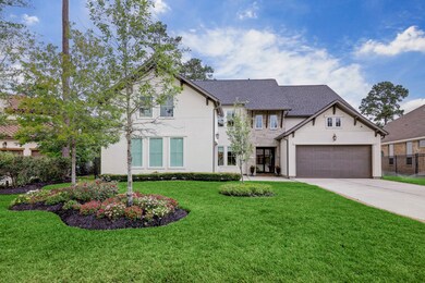 This exceptional stucco and stone home sits on a q