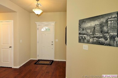 The welcoming Foyer provides gorgeous Hardwood Flo