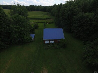 Front of cabin with nice yard and privacy