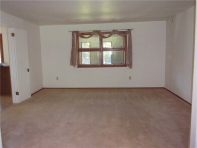 Living Room, neutral carpet.