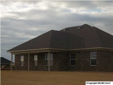 BACK VIEW WITH COVERED PATIO