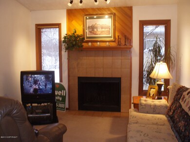 Living room with wood burning fireplace