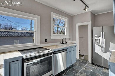 Updated kitchen with stainless appliances.
