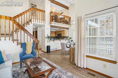 Living room featuring light hardwood / wood-style 