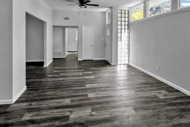 THIS VIEW SHOWS THE GLASS BLOCK BY FRONT DOOR & AL