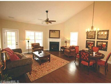 Den/Family/Great Room. Large greatroom with plenty of light, vaulted ceilings, hardwoods opening directly to covered porch, perfect for entertaining or just relaxing!