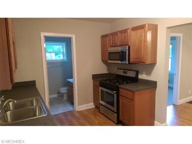 Kitchen full bath in back ground