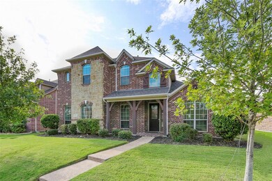 Gorgeous stone elevation with front porch!
