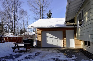 Enclosed carport with new siding