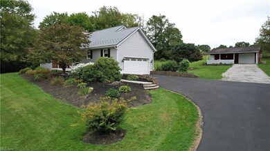 View of front of house with a front yard