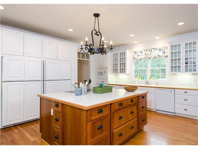 Kitchen with double built in refrigerators, tile t