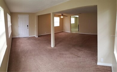 Dinning room looking to main entrance (left) and l