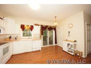 Kitchen with Deck to Backyard