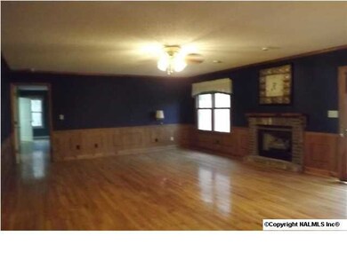 FAMILY ROOM WITH GAS LOG FIREPLACE, HARDWOOD FLOOR