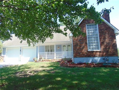 907 N Jackson St, Raymore, MO 64083 - photo 5