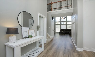 Upon entering this immaculate, clean home, you immediately see a continuous flow of vinyl plank flooring & light neutral painted walls.