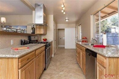 Featuring new hickory cabinetry & granite counters