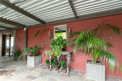 Shaded entrance just beyond the gate
