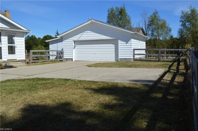 Concrete driveway with easy turnabout/extra parkin