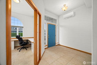 The office or den is just off the entry.