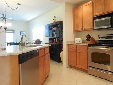 Kitchen. Beautiful granite counters and cabinets.