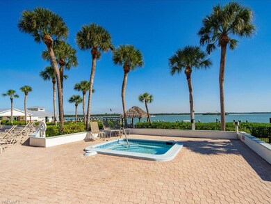 View of swimming pool featuring a water view and a