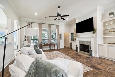 THE WINDOWS OPEN UP TO THE BACK SCREEDED PATIO 
T