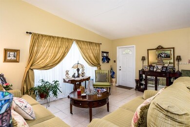 Living Room with gorgeous, neutral ceramic tile