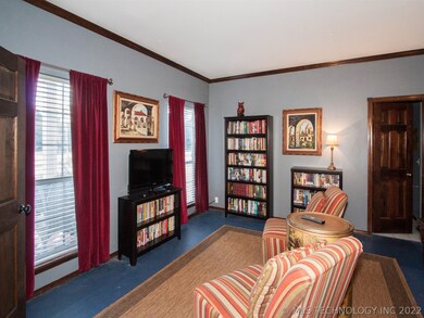 This large room off the front entryway has an adjo