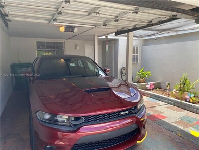 Open garage + courtyard, this townhome offers lots of privacy.