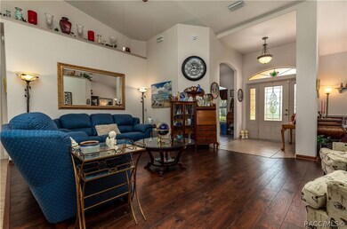 Formal living room at inside front entrance with f