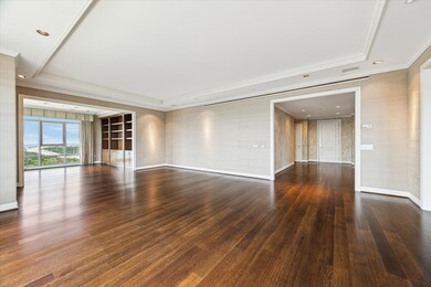 Views of the foyer to the right and den to the lef