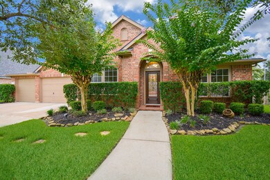 Look at this fabulous home located on a large corner lot!  This home has a nice long sidewalk leading to the front door.