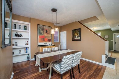 The sleek drop chandelier adds an elegant touch in