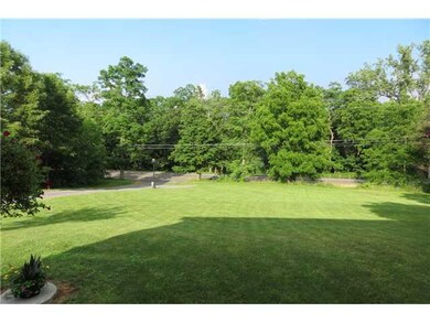 View. Deep front yard with seasonal view of Seneca