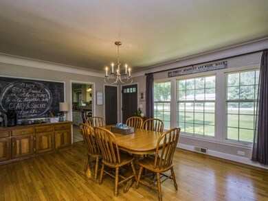 Formal dining room with hardwood floor