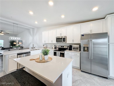 Kitchen featuring appliances with stainless steel