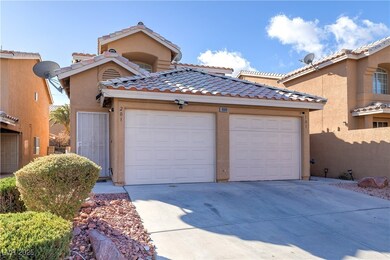 View of front of property featuring a tiled roof,