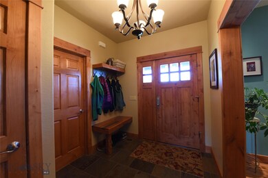 Front Entry with Built in Bench and Coat Storage.