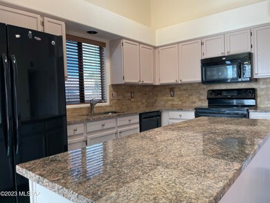 Updated kitchen - granite and backsplash