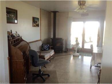 Conversation area of country kitchen. Sliding door