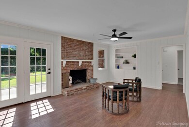 Living room featuring hardwood / wood-style floors
