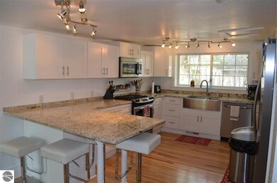 301 Ames St, Elk Rapids, MI 49629 - photo 3